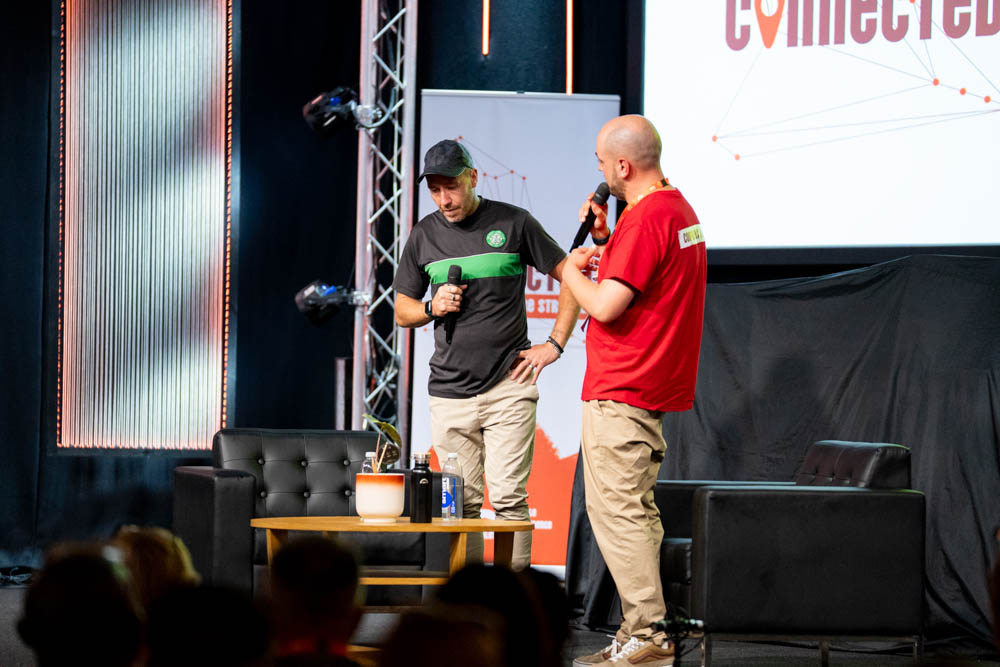 A Langley client on stage sharing his story